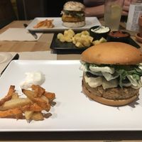 Burgers and patatas bravas at Melocotón Vegan Burger in Barcelona