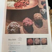 Menu page showing "bliss balls" at Latte Graphic in Tokyo