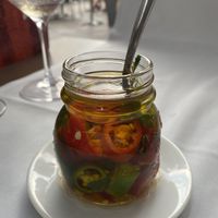 Peperoni-Öl als Snack mit Pizza-Brötchen  at Tango in Lugano