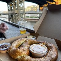 Pretzel 🥨 with mustard - but the other sauces are not plant basedd  at Lakefront Brewery in Milwaukee