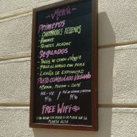 outside sign at Domi in Madrid