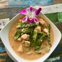 fresh Lemongrass Curry wirh baby beans and snowpeas simmered in coconut mild at Laughing Chicken in Sanur