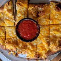 Cheesy bread with vegan cheese at Brick Road Pizza Co in Grand Rapids