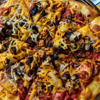 Vegan deluxe pizza at Brick Road Pizza Co in Grand Rapids