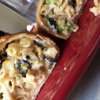 Vegan Mac n Cheese Calzone (w black olives and broccoli) at Brick Road Pizza Co in Grand Rapids