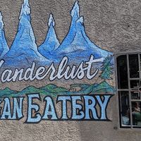 Cute outside mural at Wanderlust Vegan Eatery in Albuquerque