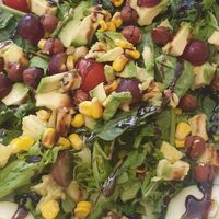 Vegan salad. Corn, hazelnuts, pineapple, grape and avocado at Papaya in Faro