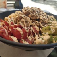 Tomate, aguacate, quinoa, tofu, piña at Poké Lagos in Lagos