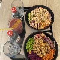 Two build your own poké bowls. One with soy sauce dressing, one with spicy mayo.  at Poké Lagos in Lagos