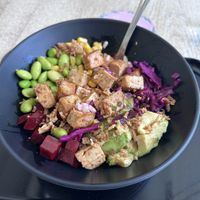 Brown rice, tofu, edemame, red cabbage, beets, avocado  at Poké Lagos in Lagos