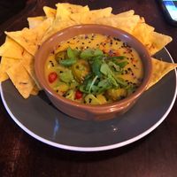 Nacho and cheese sauce  at Bio Cafe in Aberdeen
