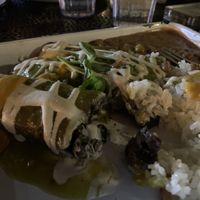 Vegan blackened mushroom enchiladas with verde sauce   at Cielo Rojo in Takoma Park