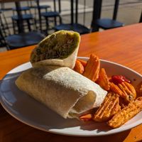 Green River wrap with sweet potato wedges at The Church Cantina in Tacoma