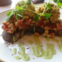 Smoky beans, tofu scramble and avo sauce on toasted sour dough at Hula in Edinburgh