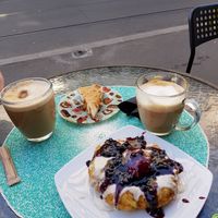 Salty Caramel Cheesecake and Papanasi...definitely recommend the papanasi!! at Level Up in Bucharest