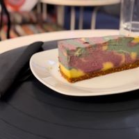 Superfoods cheesecake (ingredients: cashew, oat, goji, almond, dates, lemon, spirulina, agave, chokeberry, beetroot, vanilla)  at Level Up in Bucharest