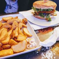Double "cheese" burger and potato wedges at Level Up in Bucharest