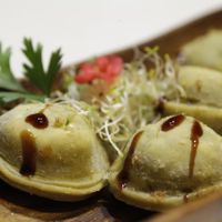 sorrentinos fritos con salsa de hongos at Namaste in Montevideo