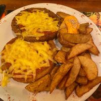Milanesa com queijo vegetal e papas fritas at Namaste in Montevideo