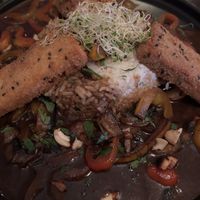 Tofu crujiente, con timbal de arroz y una salsita con hongos y verduras salteadas. Muuuy rico   at Namaste in Montevideo