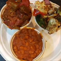 Clockwise from top left: okra stew, cauliflower medley, baked beans at Sweet Home Cafe in Washington