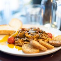 Scaloppine al Limone with Mushrooms and potatoes. Yummy!!! at Maccaroni Trattoria Italiana in Melbourne