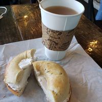 Rosemary bagel with tofutti and earl gray tea with almond milk. at Leroy's Bagels in Denver