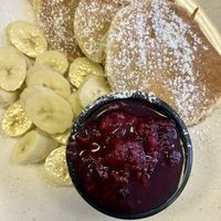 Pancakes with banana and berry compote   at Little Devil's Cafe in Aberystwyth