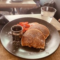 Pancakes with maple syrup and strawberries   at Little Devil's Cafe in Aberystwyth