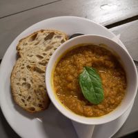 Vegan sweet potato, carrot and coriander soup with sourdough bread at Little Devil's Cafe in Aberystwyth