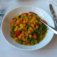 Green pasta with vegetables and saffron sauce at Waisenhaus in Thun