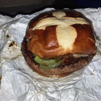 Sauerkraut burger + grilled peppers at Vegan Brüder in Fort Lauderdale