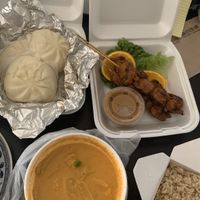 Steam buns (highly recommend!), satay, pineapple curry, and brown rice at Wheel of Life in Irvine