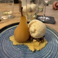 Vanilla poached pear, sweet parsnip puree, candied walnuts and vanilla ice cream   at The Crown Inn in Broughton