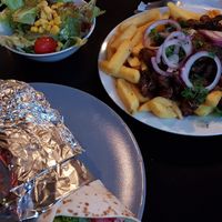 Gyros wrap & gyros on fries. at Trash Chic in Cologne