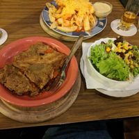 Pumpkin lasagna, salad, chili-cheese fries at Trash Chic in Cologne