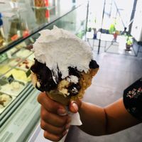 Delicious vegan gelato topped with vegan chocolate and vegan whipped cream 😲😍 at Gelateria Brivido in Rome