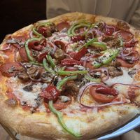 Vegan prospector— the veg cheese, sausage and pepperoni was all so good! Pizza had a lovely crunch too!   at Prospectors Pizza in Denali