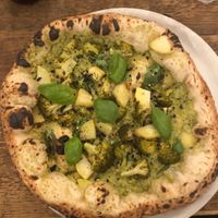 Vegan pizza with potatoes broccoli and basil  at Marghe in Milan