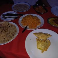 Veg samosas, tarka dal, vegetable jalfrezi, masala rice, peshwari naan & chapatis at Lonely Planet in Kovalam