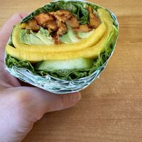 Spring sandwich in lettuce wrap. Lettuce, cucumber, avocado, sweet potato, mango, and mango sauce.   at Spring Cafe in New York City