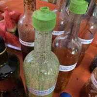 FIVE flavors of house made hot sauce.  at Mandarina in Florianopolis