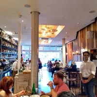 Entrance, bar and dining room at Terra Rossa in North London