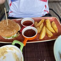 Vegan burger + extra barbecue sauce  at Veggies in Tirana