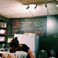 the menu and kitchen in Veggie D'light at Veggie D'Light in Toronto