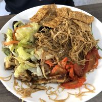 Fried bee hoon with side dishes  at Taste of Vegetarian in East Singapore