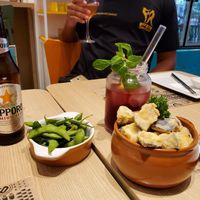 Eggplant starter, edamame, hibiscus ice tea with orange at Yasai Natural Sushi in Rio De Janeiro