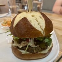 Southern Burger with Pretzel Bun  at Nourishmoi in Mississauga