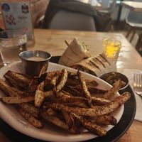 Zaa'tar fries and chickpea shawarma wrap at Nourishmoi in Mississauga