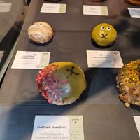 Matcha and strawberry at Crosstown Doughnuts - Cannon St in London